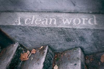 Close-up of text on wall