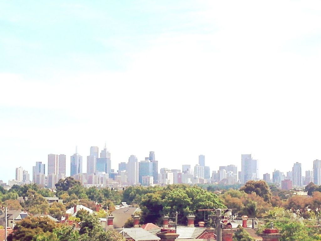 building exterior, city, architecture, skyscraper, built structure, cityscape, tall - high, modern, urban skyline, office building, tower, crowded, financial district, clear sky, sky, city life, tree, tall, skyline, growth