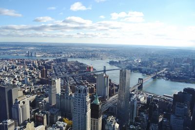 Aerial view of cityscape against sky