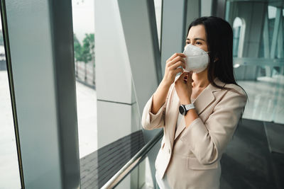 Young woman drinking coffee