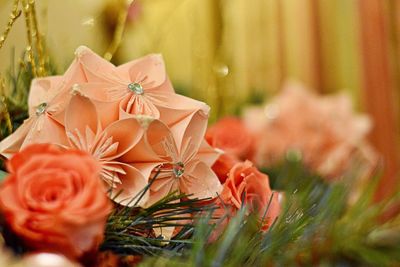 Close-up of christmas ornaments on plant