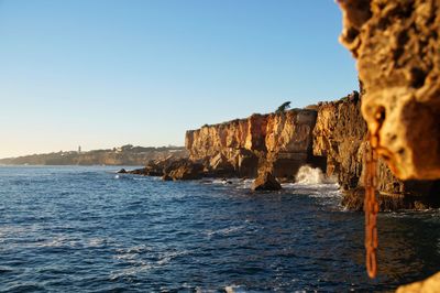 Scenic view of sea against clear sky