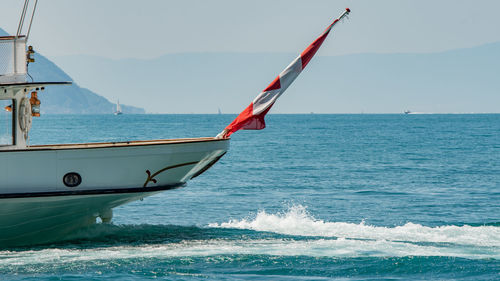 Boat in sea against sky