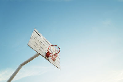 Low angle view of basketball hoop against sky