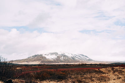 Scenic view of snowcapped mountains against sky