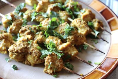 High angle view of chicken skewers in plate