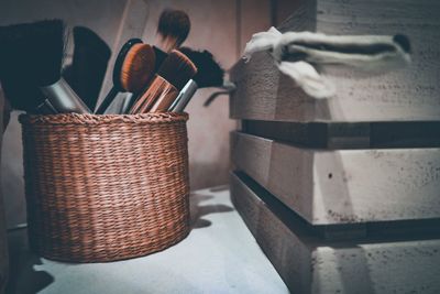 Close-up of wicker basket on table at home