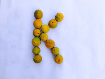 High angle view of fruits on white background