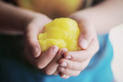 Close-up of hands holding food