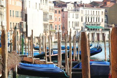 Boats moored in canal