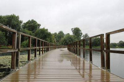 View of footbridge in rainy season