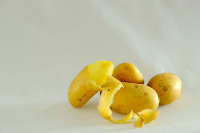 Close-up of yellow fruits on table