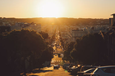 Cityscape against clear sky at sunset