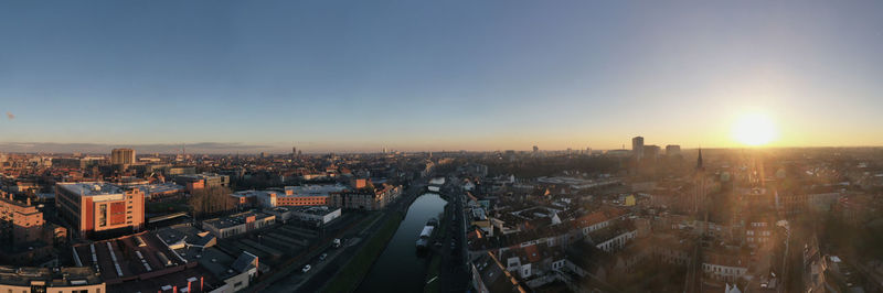 High angle view of city buildings during sunset