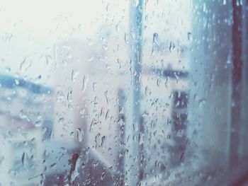 Full frame shot of wet window in rainy season