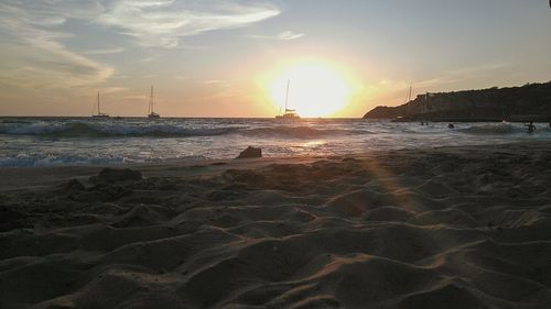 View of beach at sunset