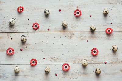 Directly above shot of red berries on table