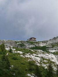 Low angle view of rocks against sky