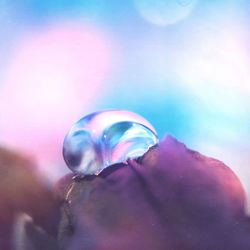 Close-up of water against blue sky