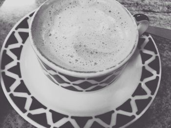 Close-up of coffee cup on table