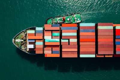 Aerial top view head shot from drone camera container cargo ship in import export 