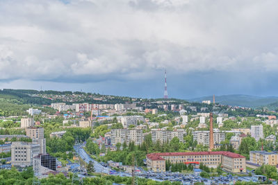 Panorama of city zlatoust, russia. view from above. summer city landscape on cloudy day. 