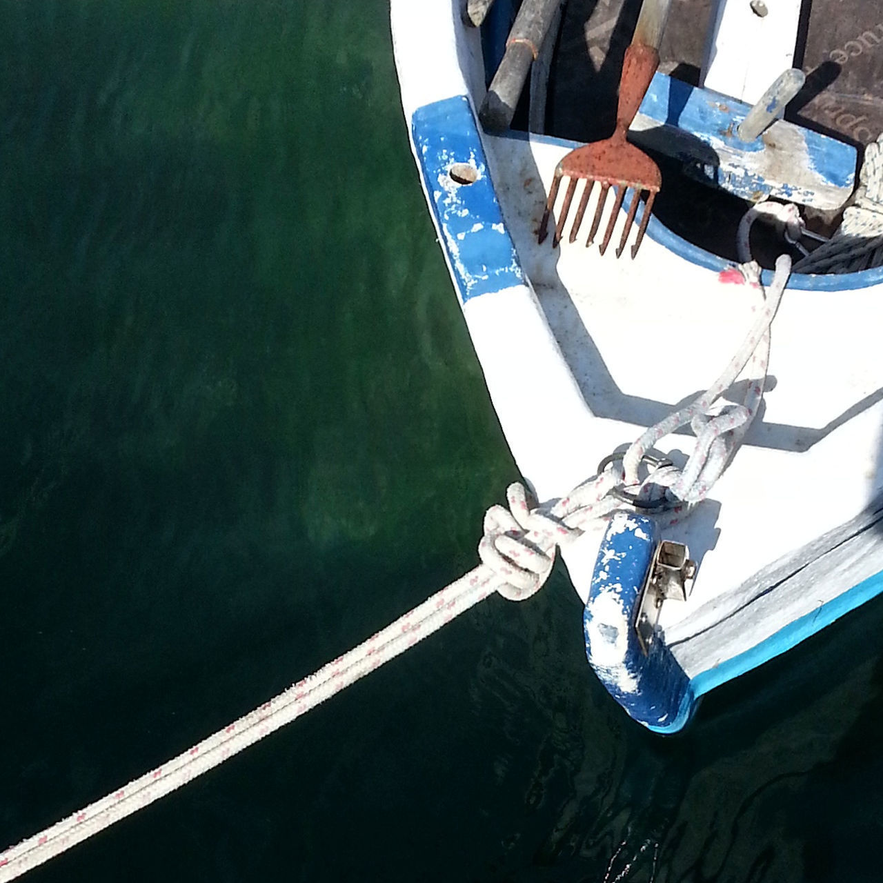 LOW SECTION OF MAN SAILING ON BOAT