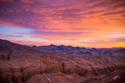 Scenic view of mountains against sky during sunset