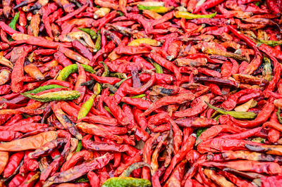 Full frame shot of red chili peppers for sale in market