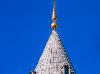 Low angle view of building against blue sky