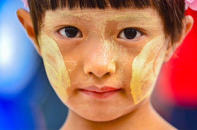 Close-up of teenage girl with face paint