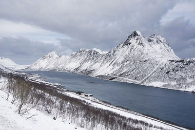 Scenic view of snowcapped mountains against sky