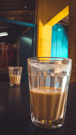 Close-up of beer in glass on table
