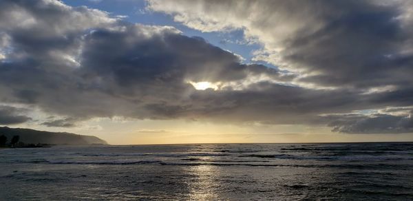 Scenic view of sea against sky during sunset