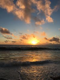 Scenic view of sea against sky during sunset