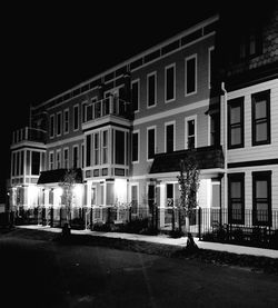 View of residential buildings at night