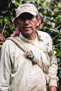 Portrait of man standing outdoors