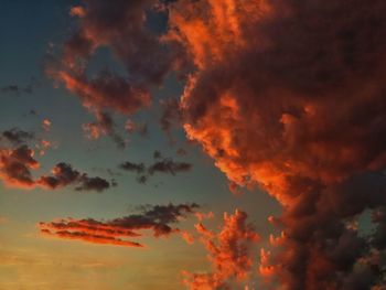 Low angle view of dramatic sky during sunset