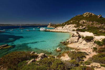 Scenic view of sea against clear blue sky