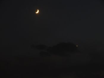 Scenic view of moon against sky at night