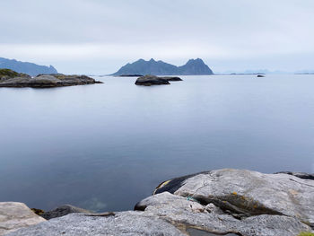 Scenic view of sea against sky and islands 