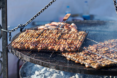 Close-up of meat on barbecue grill