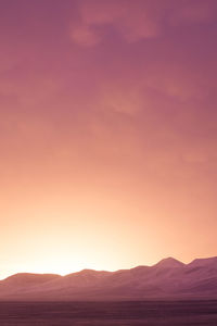 Barren landscape against the sky