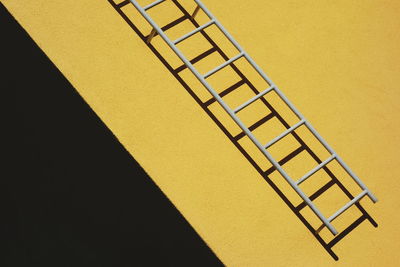 Close-up of yellow staircase