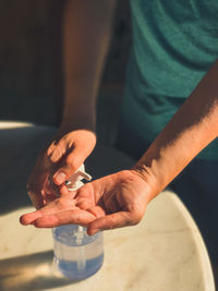 Close-up of man holding hands