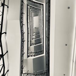 Low angle view of spiral staircase in building