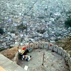 Woman standing by railing