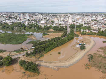 Flooded river with mud after construction of dam