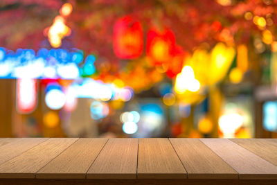 Close-up of illuminated lights on table