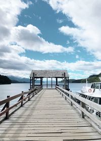 Pier over sea against sky